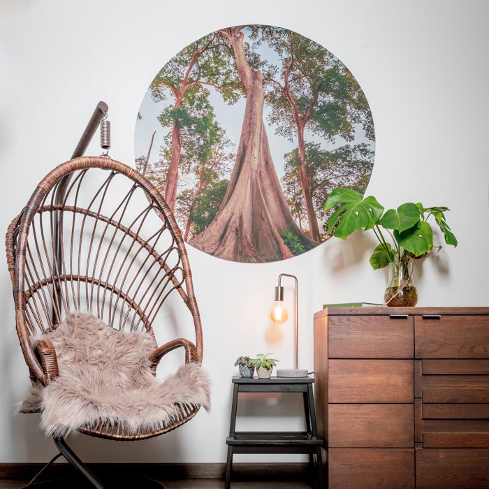 Ronde behangcirkel met print op de wand